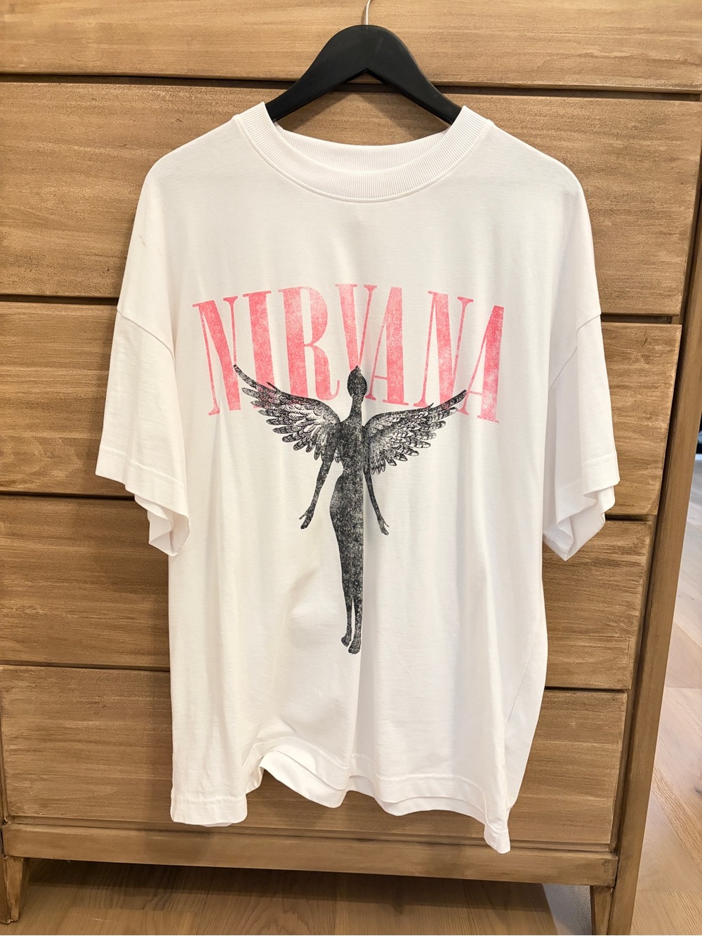 H&M White Short Sleeve Tee with Pink 'NIRVANA' Logo and Black Angel Graphic